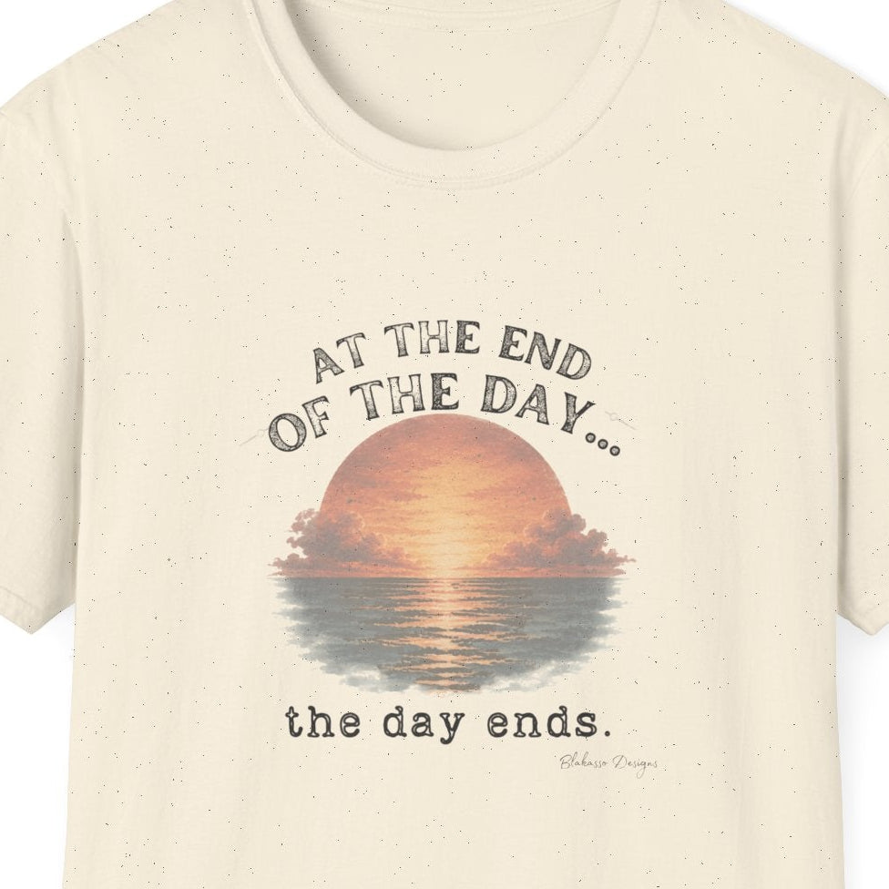 Close view of the At the End of the Day the day ends design featuring a weathered sunset and vintage inspired typography.