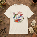 Color & Chaos hummingbird and watercolor flower unisex graphic tee flat lay