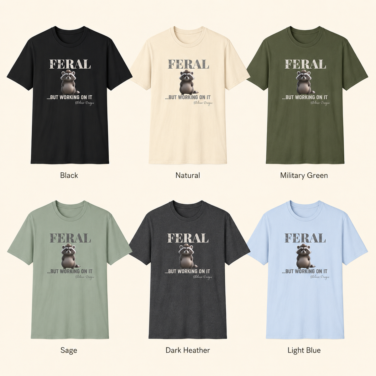 Feral But Working On It raccoon shirts in Black, Natural, Military Green, Sage, Dark Heather, and Light Blue