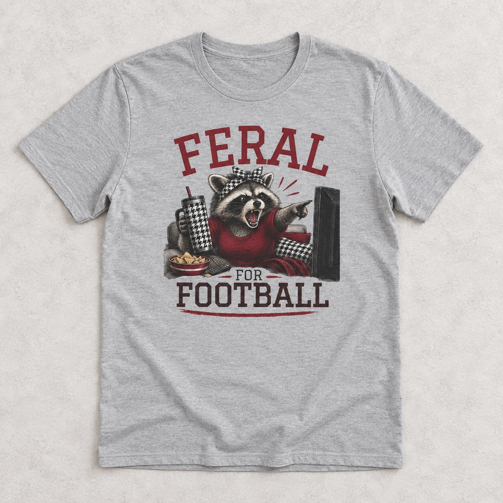 Feral for Alabama funny football shirt shown in a styled flat lay