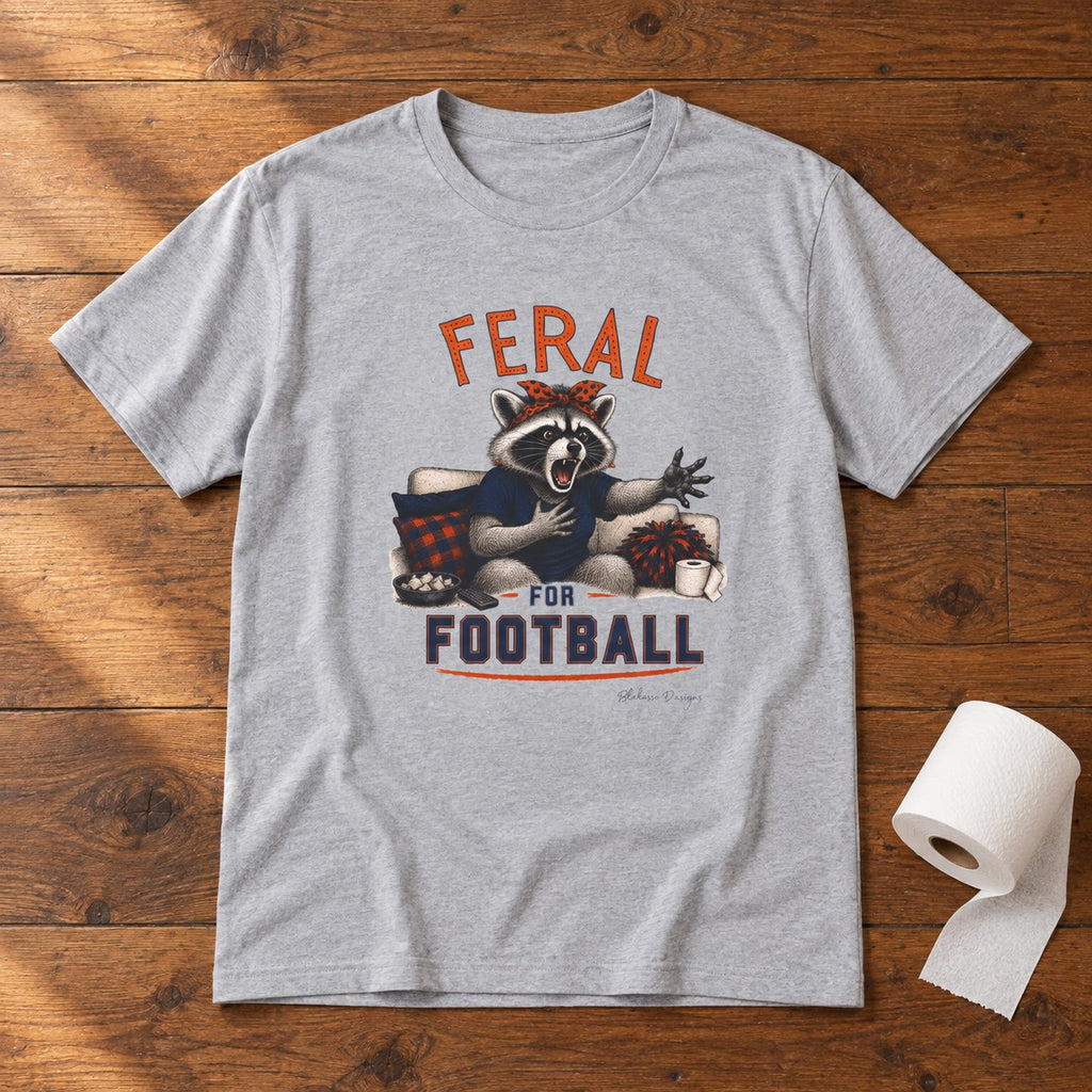 Sport gray Feral for Auburn football shirt displayed on a wooden floor with toilet paper