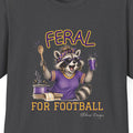 Close up of Feral for Football LSU raccoon shirt design in purple, gold, black, and graphite style on a dark heather T shirt.