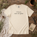 I Bloom Out of Spite unisex graphic tee in Natural flat lay