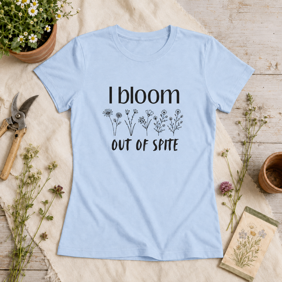 I Bloom Out of Spite women’s floral graphic tee flat lay