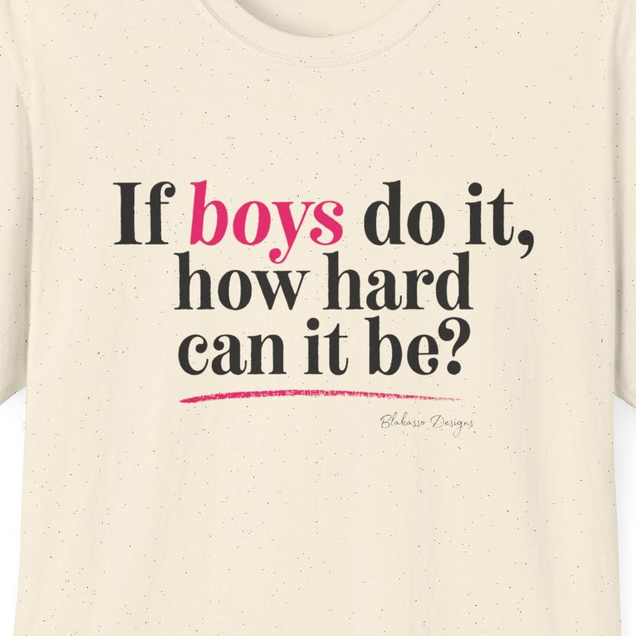 Close up of natural If Boys Do It How Hard Can It Be T shirt with dark lettering and bright pink accent