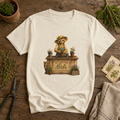 We Mind Our Herbs and Our Business Miss Sammye Raccoon Council graphic tee flat lay