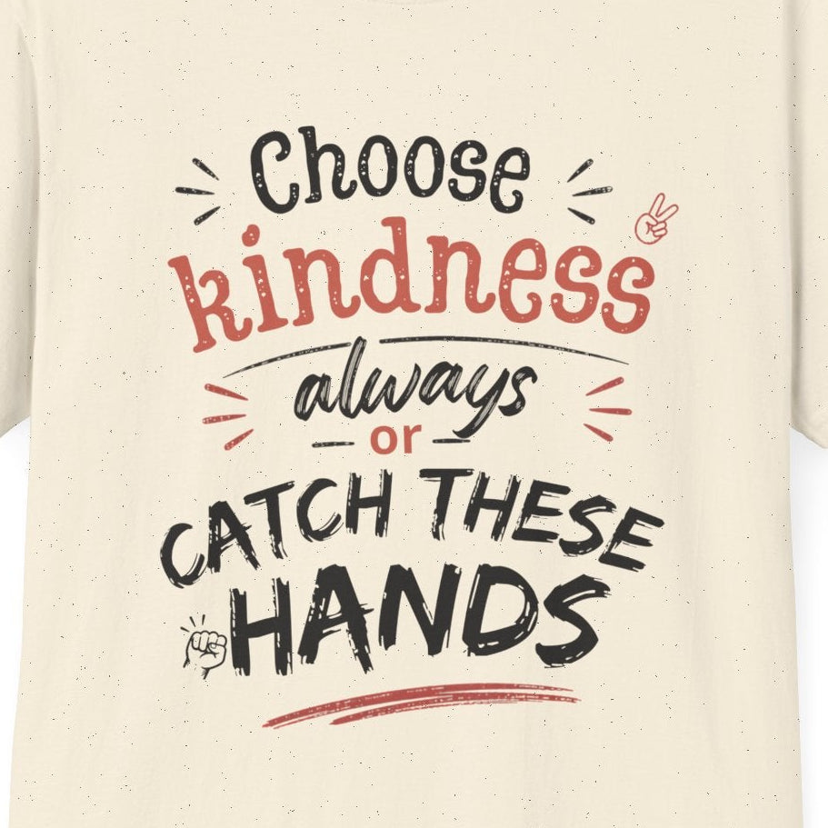 Close view of the distressed Choose Kindness Always or Catch These Hands typography design with coral accents, peace sign, and fist details.