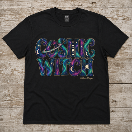 Black crew neck T-shirt featuring the Cosmic Witch galaxy design with aurora colors, moon phases, stars and celestial details.