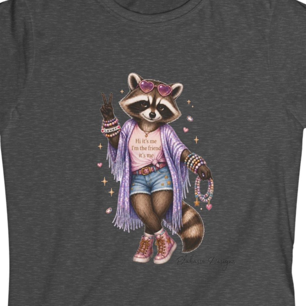 Close up of LouLou the raccoon wearing heart shaped sunglasses and colorful friendship bracelets on a music inspired graphic tee.