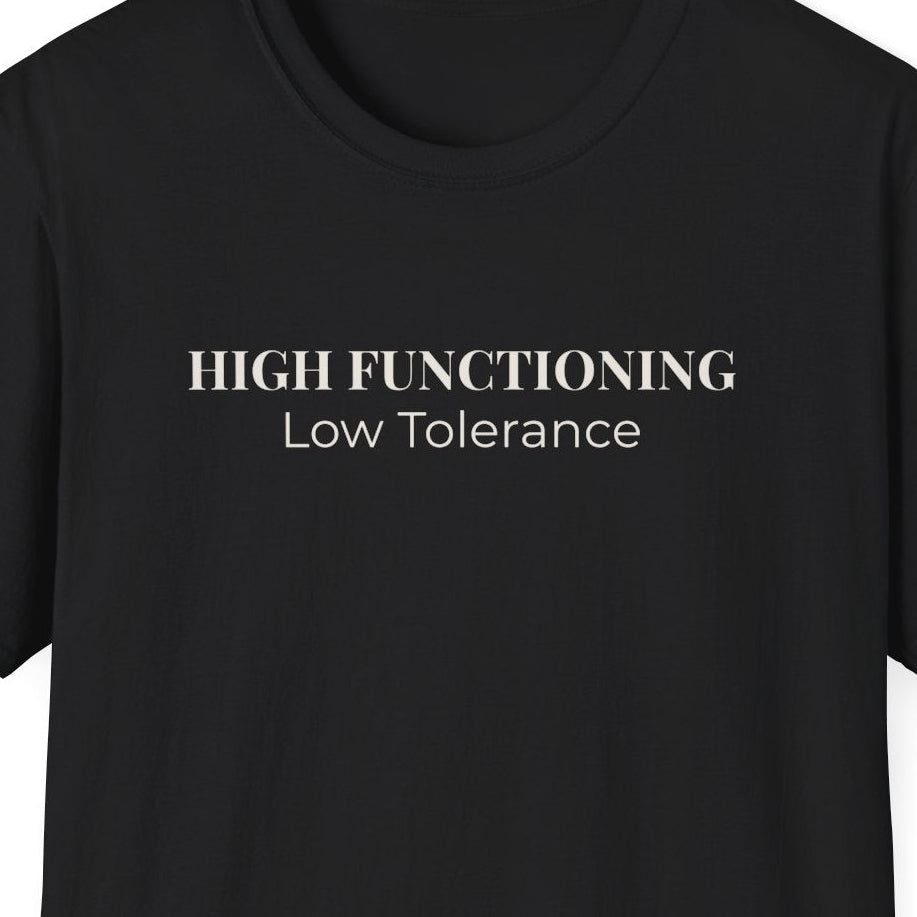 Close view of the High Functioning Low Tolerance design printed across the front of the shirt.