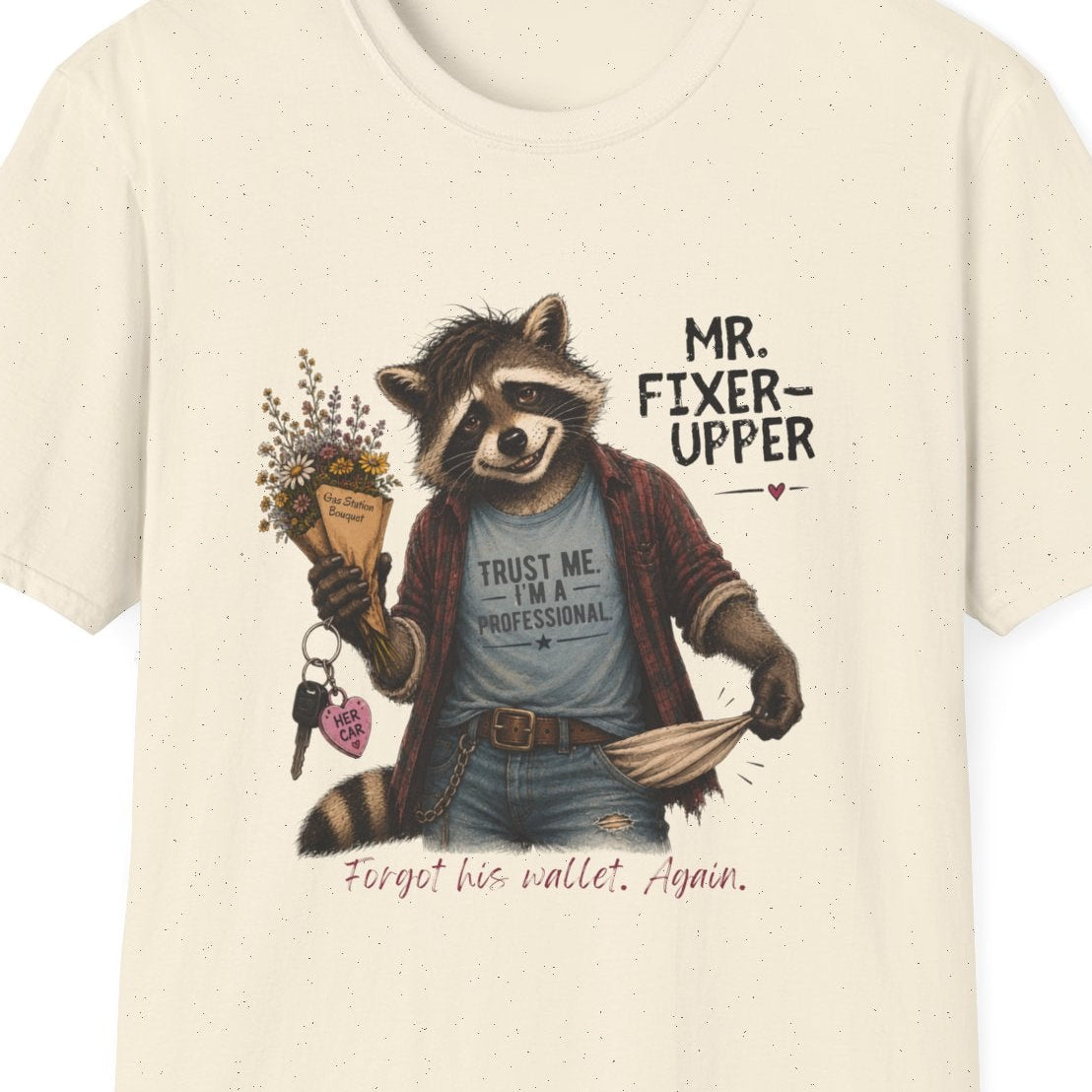 Close up of the Mr. Fixer Upper raccoon design with gas station flowers, her car keys, empty pocket, and Trust Me I’m a Professional shirt.