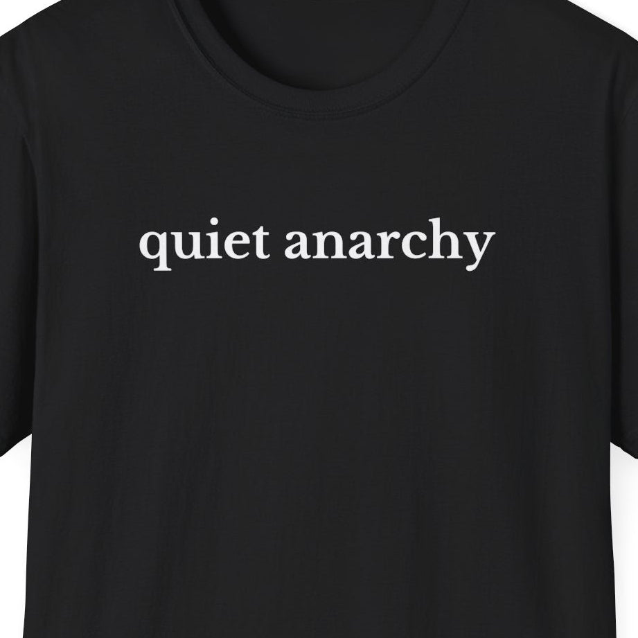 quiet anarchy close crop on black with off-white text