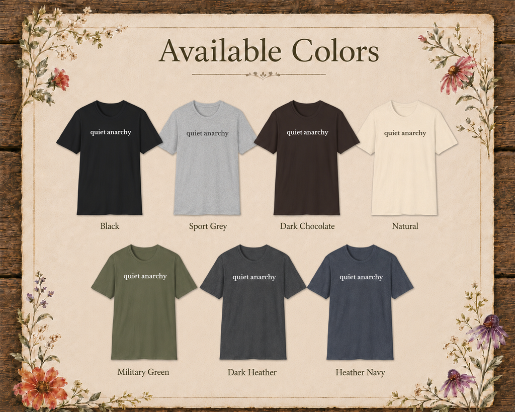 An informational graphic titled 'Available Colors' showing eight short-sleeve T-shirts in different colors arranged in two rows on a parchment-style background with floral corner decorations. The shirts include Black, Sport Grey, Dark Chocolate, Natural, Military Green, Dark Heather, and Heather Navy, each labeled with the text 'quiet ancestry'.