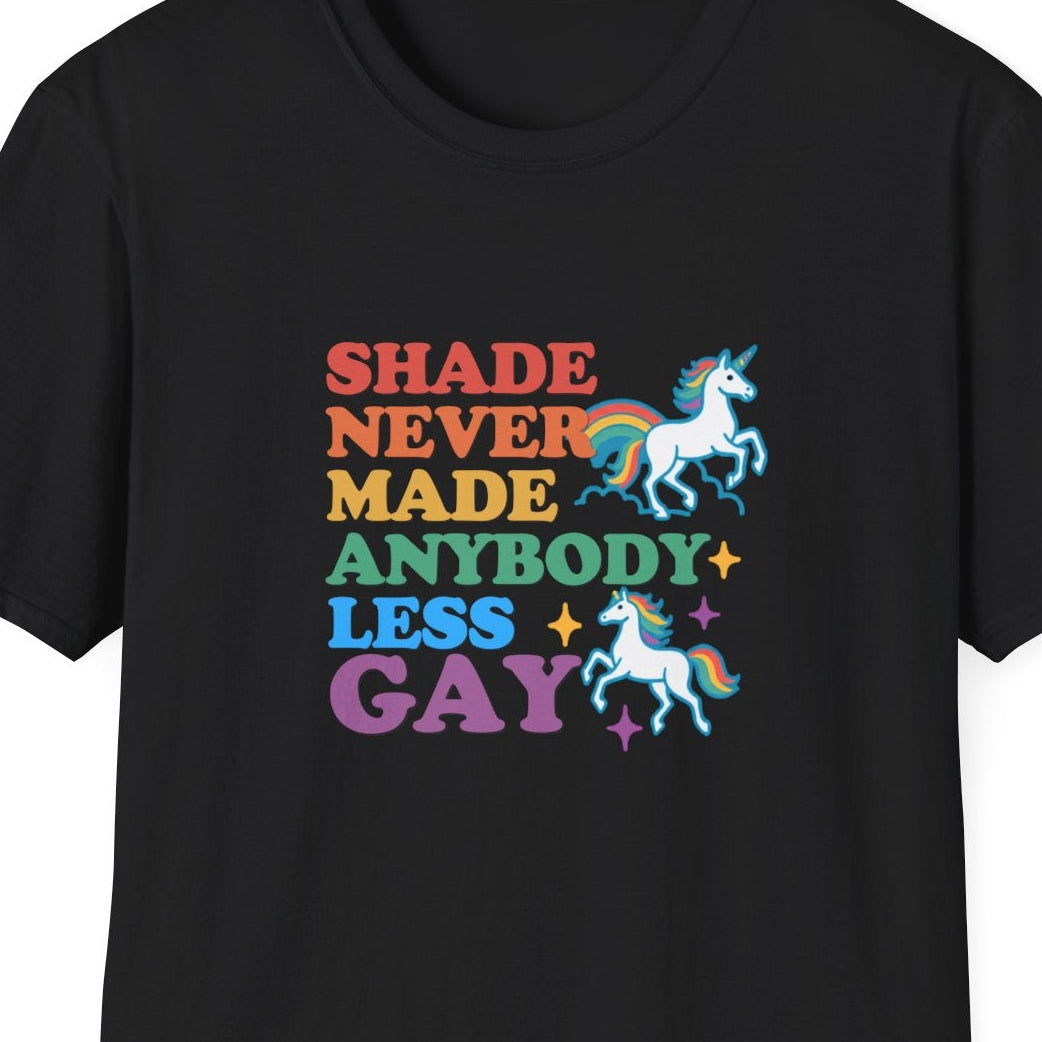 Close up of the Shade Never Made Anybody Less Gay design with rainbow retro lettering, two colorful unicorns, and sparkle accents on a black tee.