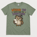 Sage Halloween teacher T-shirt with owl design and the words Witching You Would Read the Directions.