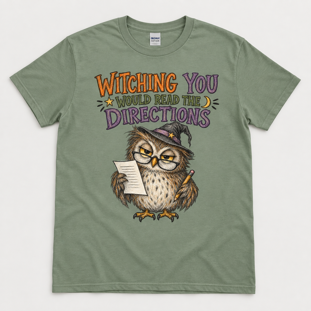 Sage Halloween teacher T-shirt with owl design and the words Witching You Would Read the Directions.